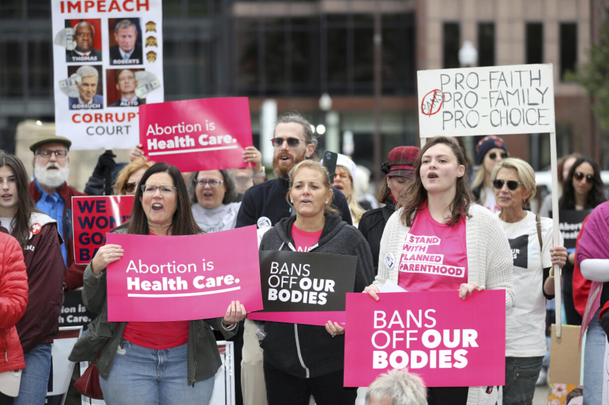 FILE - Supporters of Issue 1, the Right to Reproductive Freedom amendment, attend a rally in Columbus, Ohio, Oct. 8, 2023. The Biden campaign is betting big on abortion rights as a major driver in the 2024 presidential election. But the economy, foreign policy, immigration and inflation are also major issues for voters, as Biden tries to boost his low poll numbers.