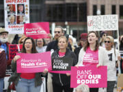 FILE - Supporters of Issue 1, the Right to Reproductive Freedom amendment, attend a rally in Columbus, Ohio, Oct. 8, 2023. The Biden campaign is betting big on abortion rights as a major driver in the 2024 presidential election. But the economy, foreign policy, immigration and inflation are also major issues for voters, as Biden tries to boost his low poll numbers.