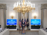 President Joe Biden speaks during a meeting with his reproductive rights task force to mark the 51st anniversary of the Roe v. Wade decision, in the State Dining Room of the White House, Monday, Jan. 22, 2024, in Washington.Biden and Vice President Kamala Harris will join forces at a rally in Virginia on Tuesday as they push for abortion rights.