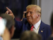 Republican presidential candidate former President Donald Trump greets people after speaking during a commit to caucus rally, Saturday, Jan. 6, 2024, in Clinton, Iowa.