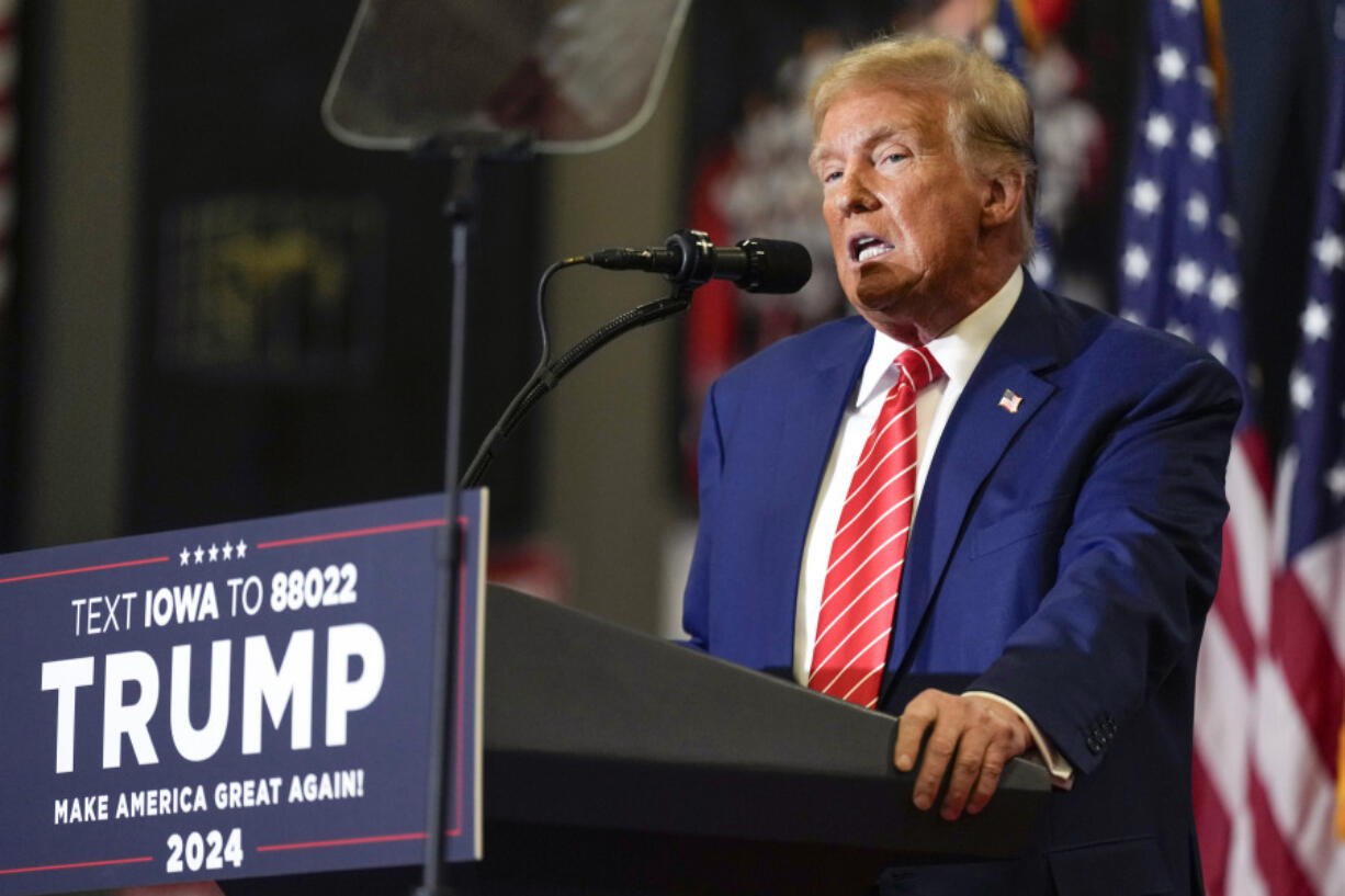 FILE - Republican presidential candidate former President Donald Trump speaks during a commit to caucus rally, Saturday, Jan. 6, 2024, in Clinton, Iowa. Trump is seizing on his party&#039;s frustration with the recent surge of illegal crossings at the southern U.S. border to churn up fears around voter fraud.