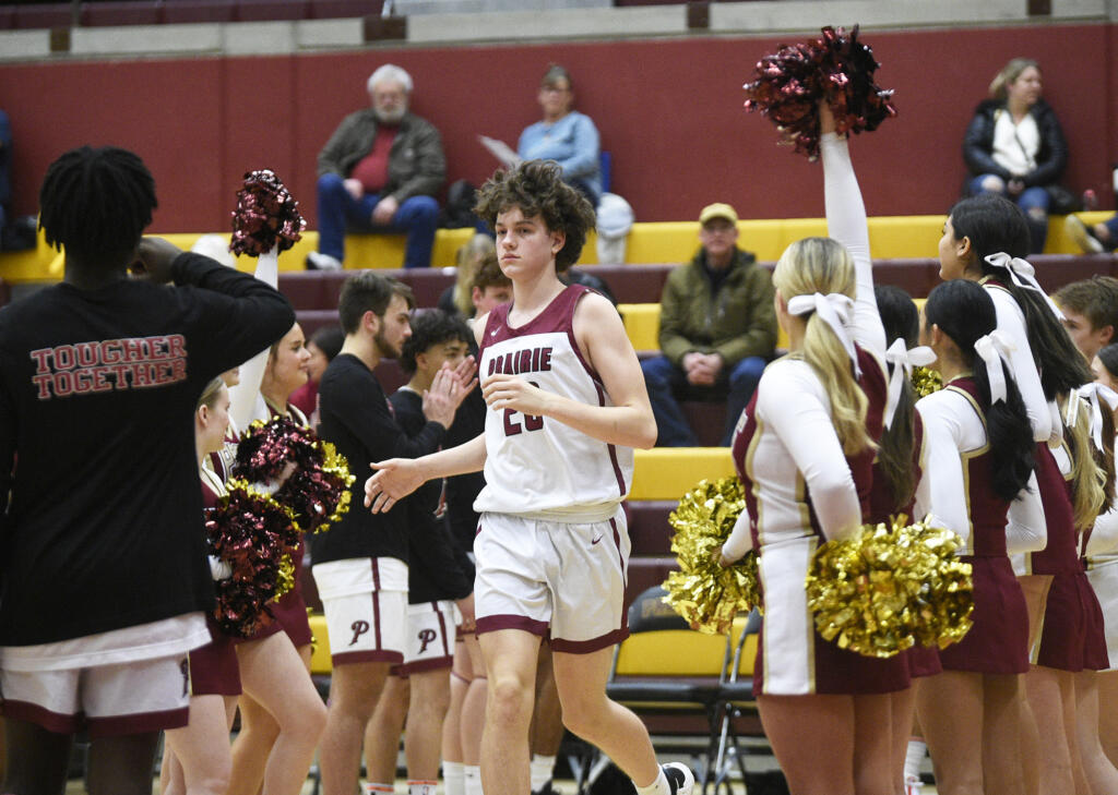 Prairie sophomore Carson Morningstar (20) is introduced prior to the Falcons' game against Evergreen at Prairie High School on Tuesday, Jan. 2, 2024.