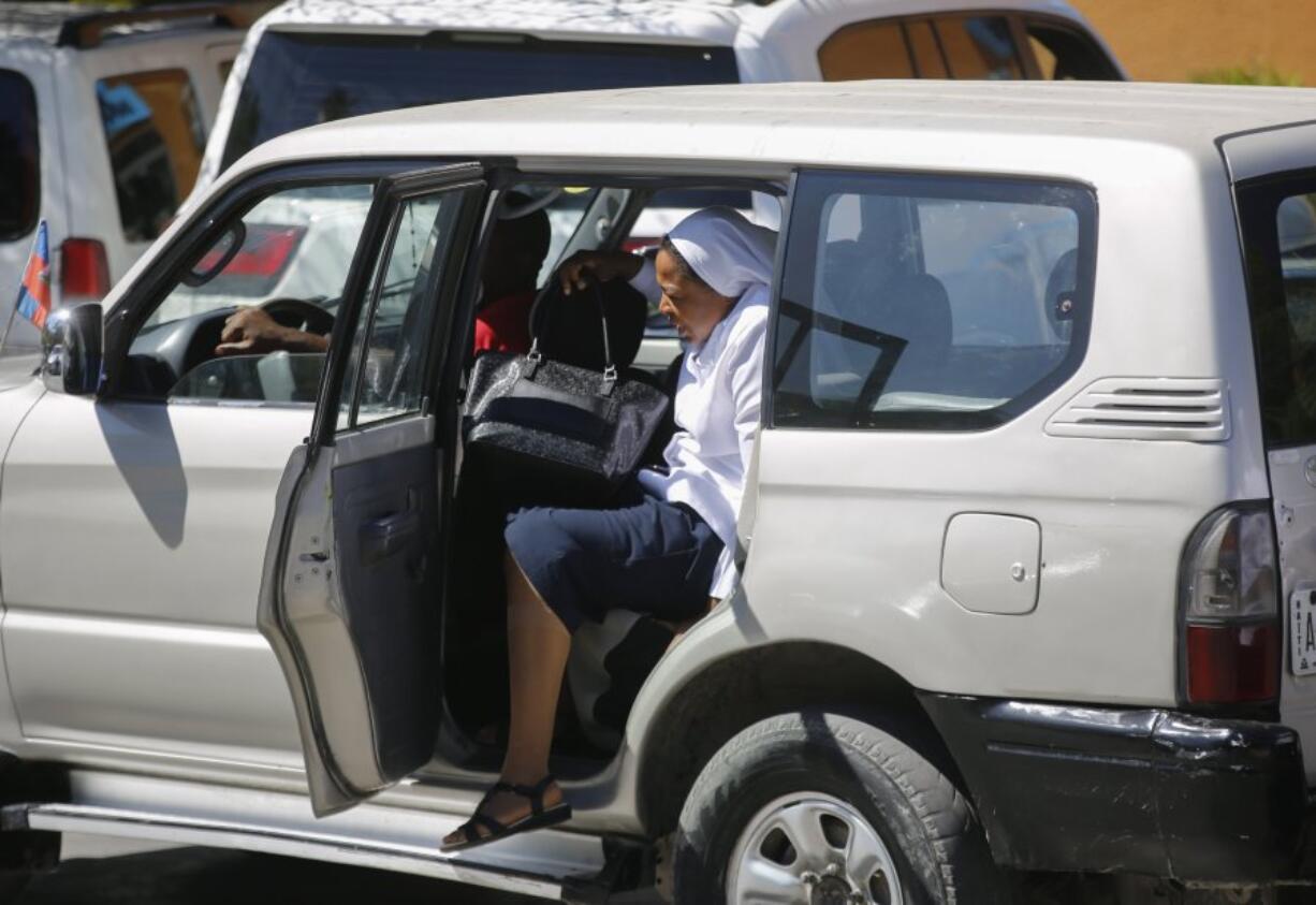 One of six Catholic nuns who were kidnapped by gangs arrives to a hospital the day after being released in Port-au-Prince, Haiti, Thursday, Jan. 25, 2024. Six nuns kidnapped in Haiti last week along with two other people have been released, according to the archbishop of Port-au-Prince.