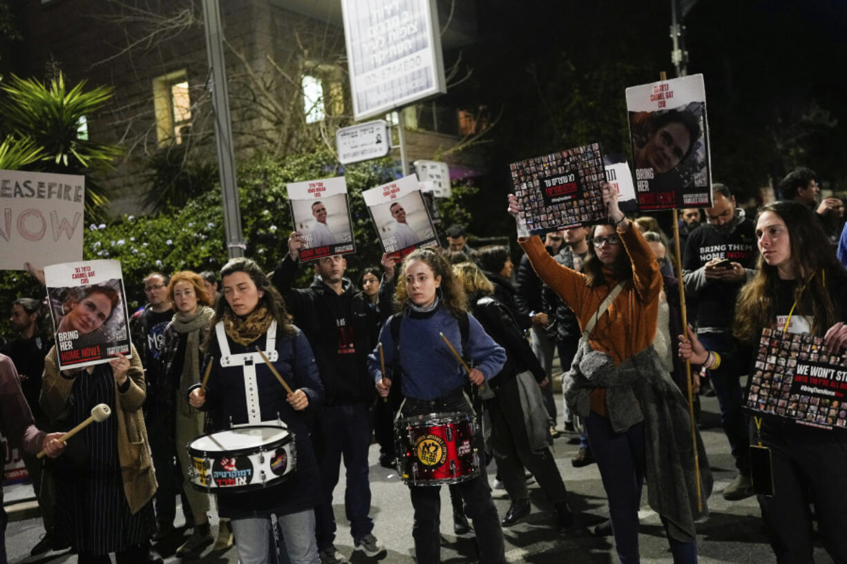 Relatives and supporters of the Israeli hostages held in the Gaza Strip by the Hamas militant group attend a protest calling for their release outside Israeli Prime Minister Benjamin Netanyahu&#039;s residence, in Jerusalem, Sunday, Jan. 21, 2024.