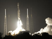 FILE - A SpaceX Falcon 9 rocket, with a payload including two lunar rovers from Japan and the United Arab Emirates, lifts off from Launch Complex 40 at the Cape Canaveral Space Force Station in Cape Canaveral, Fla., on Dec. 11, 2022. But later in April 2023, the spacecraft from a Japanese company apparently crashed while attempting to land on the moon. Japan now hopes to make the world&rsquo;s first &ldquo;pinpoint landing&rdquo; on the moon early Saturday, Jan. 20, 2024, joining a modern push for lunar contact with roots in the Cold War-era space race between the United States and the Soviet Union.