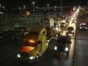 A truck carrying Benito the giraffe is escorted by a convoy of vehicles with officers from the Federal Attorney for Environmental Protection and the National Guard in Ciudad Juarez, Mexico, Sunday, Jan. 21, 2024. After a campaign by environmentalists, Benito left Mexico&rsquo;s northern border and its extreme weather conditions Sunday night and headed for a conservation park in central Mexico, where the climate is more akin to his natural habitat and already a home to other giraffes.