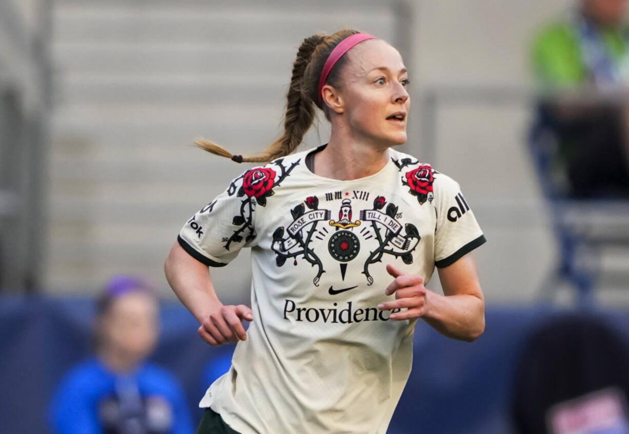 FILE - Portland Thorns defender Becky Sauerbrunn (4) runs during the second half of an NWSL soccer match against the OL Reign, Saturday, June 3, 2023, in Seattle. Veteran defender Becky Sauerbrunn has signed a one-year contract that will keep her with the Portland Thorns of the National Women&rsquo;s Soccer League through the upcoming season. Terms of the contract announced Tuesday, Jan. 23, 2024 were not released.