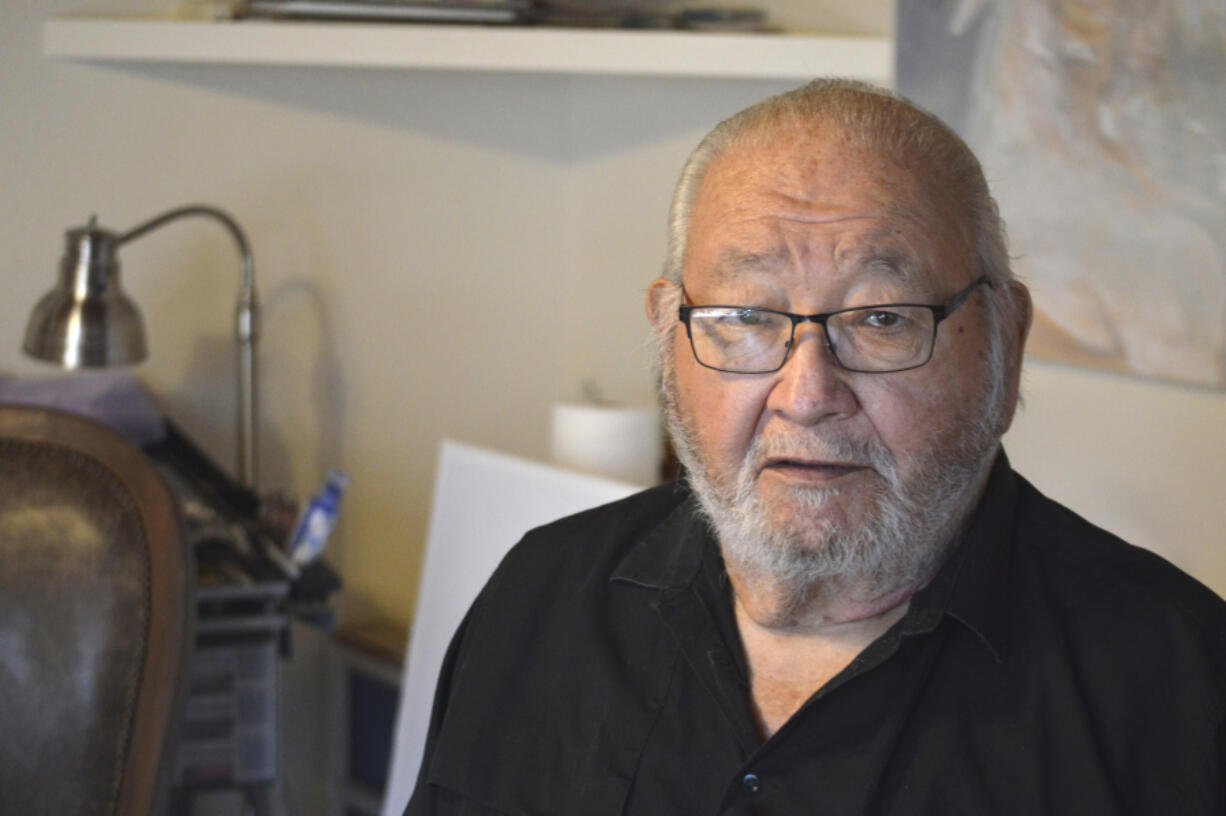 FILE - Kiowa writer N. Scott Momaday, who won a Pulitzer Prize in 1969 for his groundbreaking novel &ldquo;House Made of Dawn,&rdquo; appears at his home in Santa Fe, N.M., on Nov. 13, 2019. Momaday died Jan. 24 at his home in Santa Fe, New Mexico, publisher HarperCollins announced. He had been in failing health.