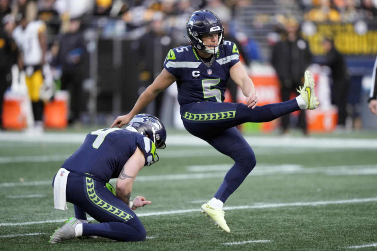 Seattle Seahawks place kicker Jason Myers (5) kicks a 43-yard field goal against the Pittsburgh Steelers in the second half of an NFL football game Sunday, Dec. 31, 2023, in Seattle.