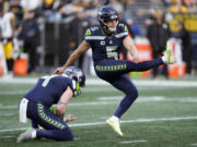 Seattle Seahawks place kicker Jason Myers (5) kicks a 43-yard field goal against the Pittsburgh Steelers in the second half of an NFL football game Sunday, Dec. 31, 2023, in Seattle.
