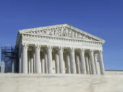 The U.S Supreme Court is photographed on Friday, Jan. 5, 2024, in Washington. The Supreme Court is allowing Idaho to enforce its strict abortion ban, even in medical emergencies, while a legal fight continues. The justices on Jan. 5, said they would hear arguments in the case in April and put on hold a lower court ruling that had blocked the Idaho law in hospital emergencies, based on a lawsuit filed by the Biden administration.