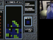 13-year-old Willis Gibson plays a game of Tetris. Gibson, who in late December became the first player to officially &ldquo;beat&rdquo; the original Nintendo version of the game, is known as &ldquo;blue scuti&rdquo; in the gaming world.