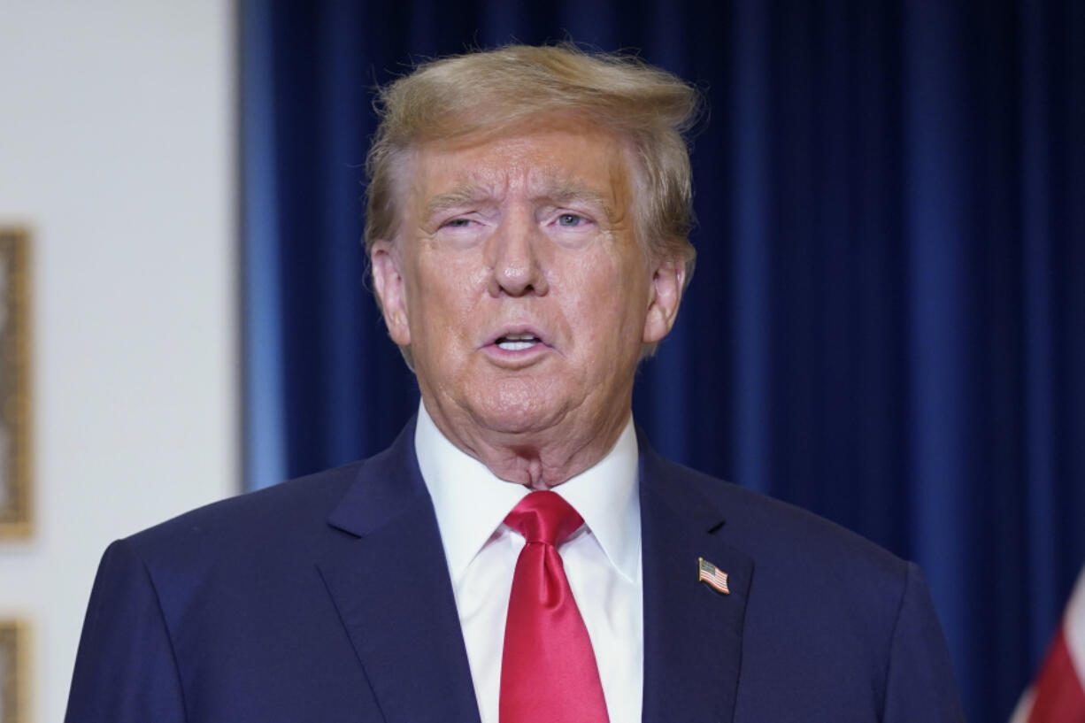 Former President Donald Trump speaks to the media at a Washington hotel, Tuesday, Jan. 9, 2024, after attending a hearing before the D.C. Circuit Court of Appeals at the federal courthouse in Washington.