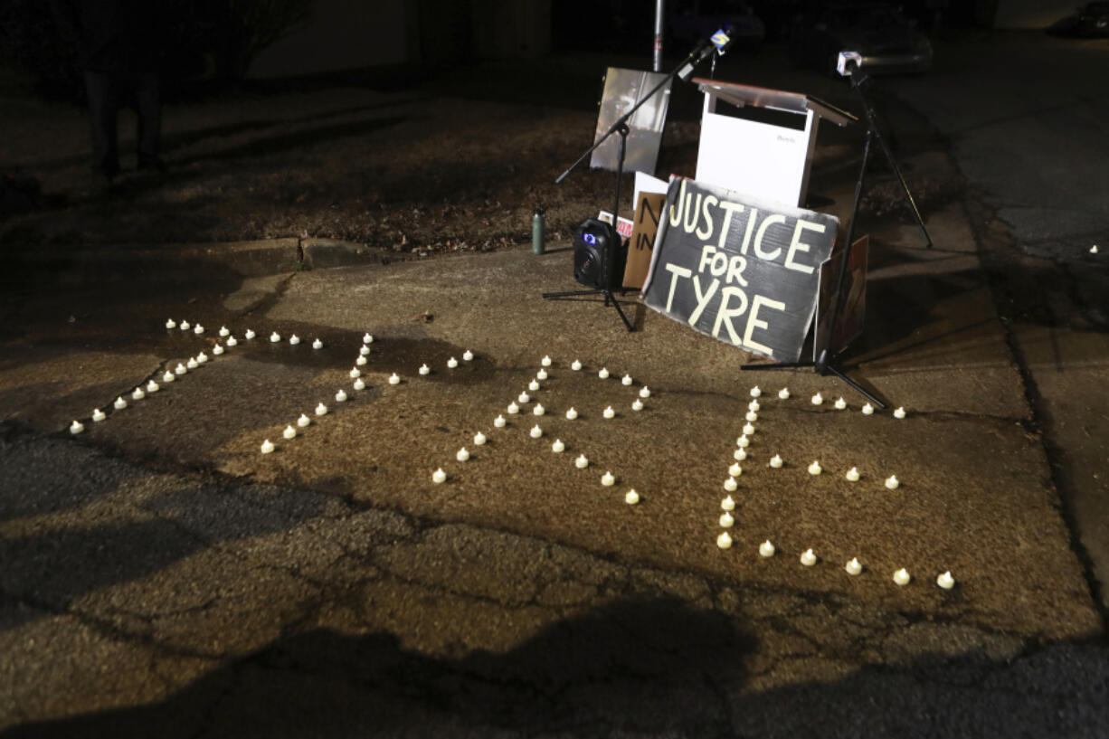 FILE - Candles spell out the name of Tyre Nichols during a candlelight vigil for Nichols on the anniversary of his death, Jan. 7, 2024, in Memphis, Tenn. The city of Memphis has released hours of more video in the case of five former police officers charged with the violent beating and death of Nichols. The recordings were released Tuesday, Jan. 30, 2024 based on a judge&rsquo;s order on the same day last November that former officer Desmond Mills Jr. pleaded guilty to federal charges.