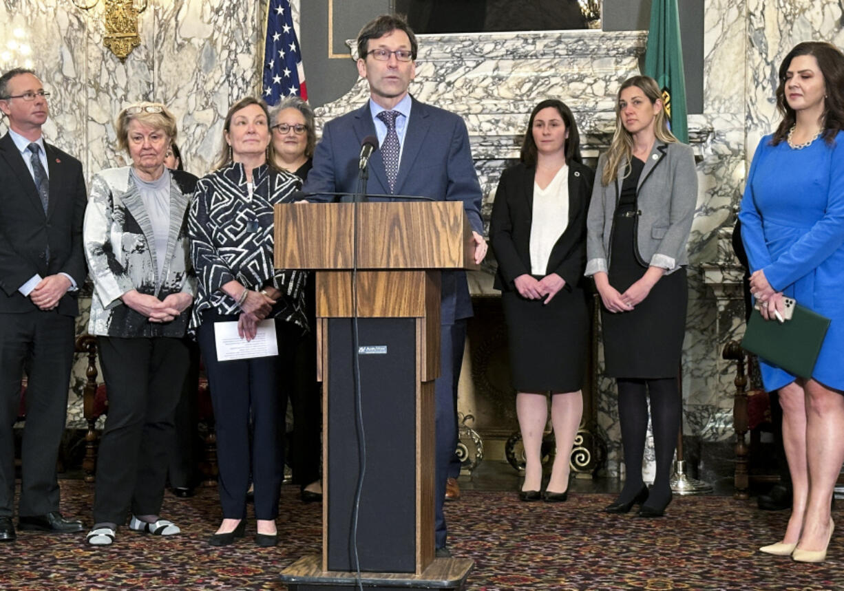 Washington Attorney General Bob Ferguson speaks on Wednesday, Jan. 24, 2024, in Olympia, Wash. Ferguson announced a $149.5 million settlement Wednesday with drugmaker Johnson &amp; Johnson, more than four years after the state sued the company over its role fueling the opioid addiction crisis.
