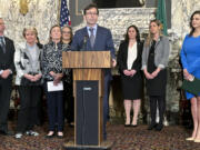 Washington Attorney General Bob Ferguson speaks on Wednesday, Jan. 24, 2024, in Olympia, Wash. Ferguson announced a $149.5 million settlement Wednesday with drugmaker Johnson &amp; Johnson, more than four years after the state sued the company over its role fueling the opioid addiction crisis.