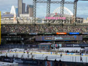 The Seattle Kraken and the Vegas Golden Knights play during the third period of the NHL Winter Classic hockey game Monday, Jan. 1, 2024, in Seattle. The Kraken won 3-0.