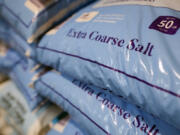 Salt is displayed for sale at Ankeny Hardware on Thursday, Jan. 11, 2024, in Portland, Ore. The Pacific Northwest is bracing for a frigid cold snap and heavy snow in the Cascades.