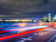 Traffic sips along a freeway in Seattle.