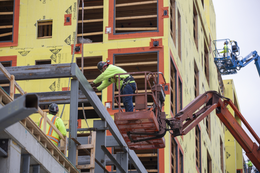 Construction was in progress this summer on The Broadstone Apartments at the Vancouver waterfront. A recent Harvard University study found that half of renters locally and nationwide spend more than 30 percent of their income on rent and utilities; 25 percent of Vancouver tenants spend more than half their income on rent.