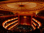 Patrons attend the Royal Opera House in London. Going to the opera or a classical music concert used to be a dress-up affair but standards have slacken in recent years.