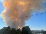 Spokane County Fire District 8 
A plume of smoke rises from the Gray Fire, which forced evacuation of the city of Medical Lake and closed Interstate 90 west of Spokane in August.