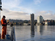 King County environmental lab scientist Mattie Michalek performs a test at Lake Washington&rsquo;s deepest location on Nov. 27 in Seattle. Her team is testing the lake to monitor its overall health and to identify temperature trends over a long period of time.