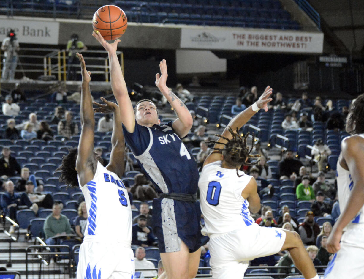 Skyview's Malakai Weimer (4) shoots against Federal Way's Amiri Holiday (5) and Candon Bible (0) during a Class 4A Hardwood Classic Round-Of-12 game on Wednesday, Feb. 28, 2024, at the Tacoma Dome.