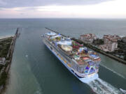 Icon of the Seas, the world&rsquo;s largest cruise ship, sails out of Government Cut between Fisher Island, right, and Miami Beach, Fla., as it departs PortMiami on its first public cruise Jan. 27.