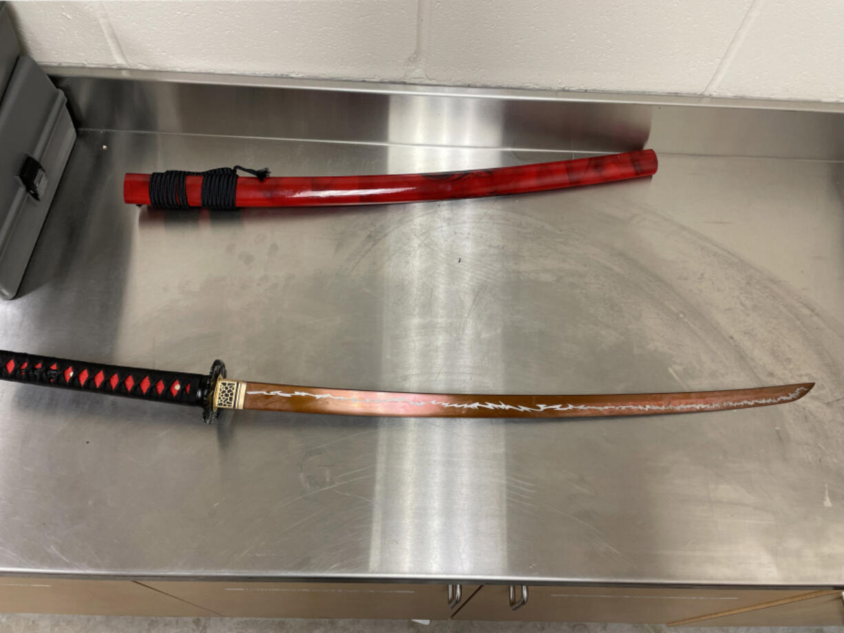 Weapons that Vancouver police says officers seized from a man who was threatening customers at an east Vancouver Walmart, which prompted an evacuation of the store.