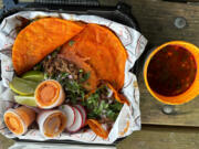 Birreria La Vaquita Food Truck outside Kalama's Mountain Timber Market serves the Chinook Sampler.