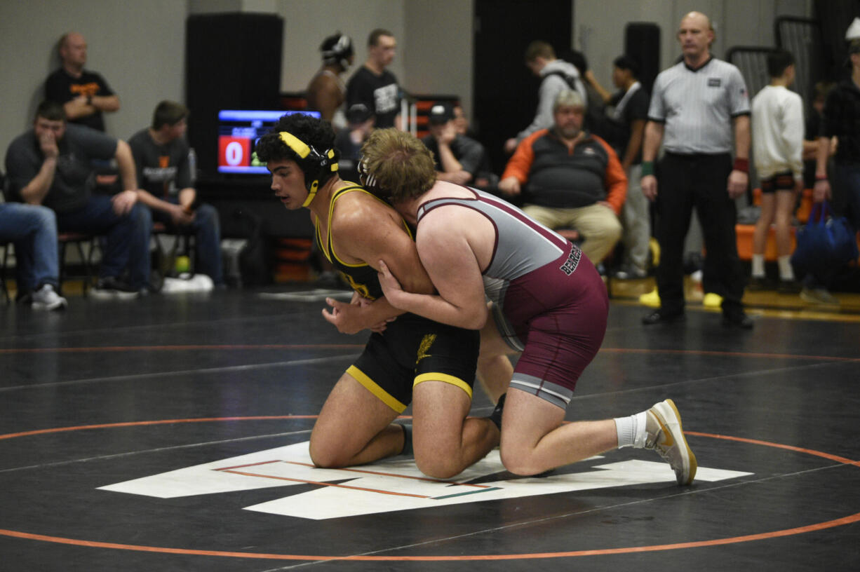 Hudson's Bay senior Talan Guerrero, left, wrestles against Kyle Nowels of W.F. West in the 190-pound title match at the 2A Boys Region 3 Wrestling Championships on Saturday, Feb. 10, 2024 at Washougal High School (Micah Rice/The Columbian).