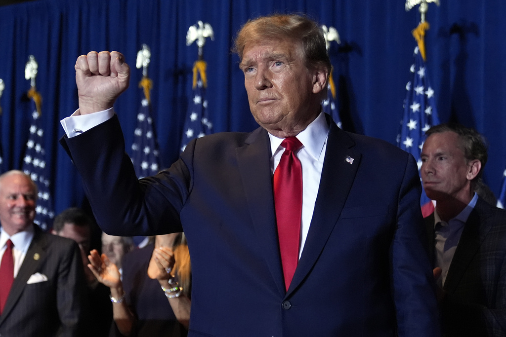 Republican presidential candidate former President Donald Trump reacts at a primary election night party at the South Carolina State Fairgrounds in Columbia, S.C., Saturday, Feb. 24, 2024.