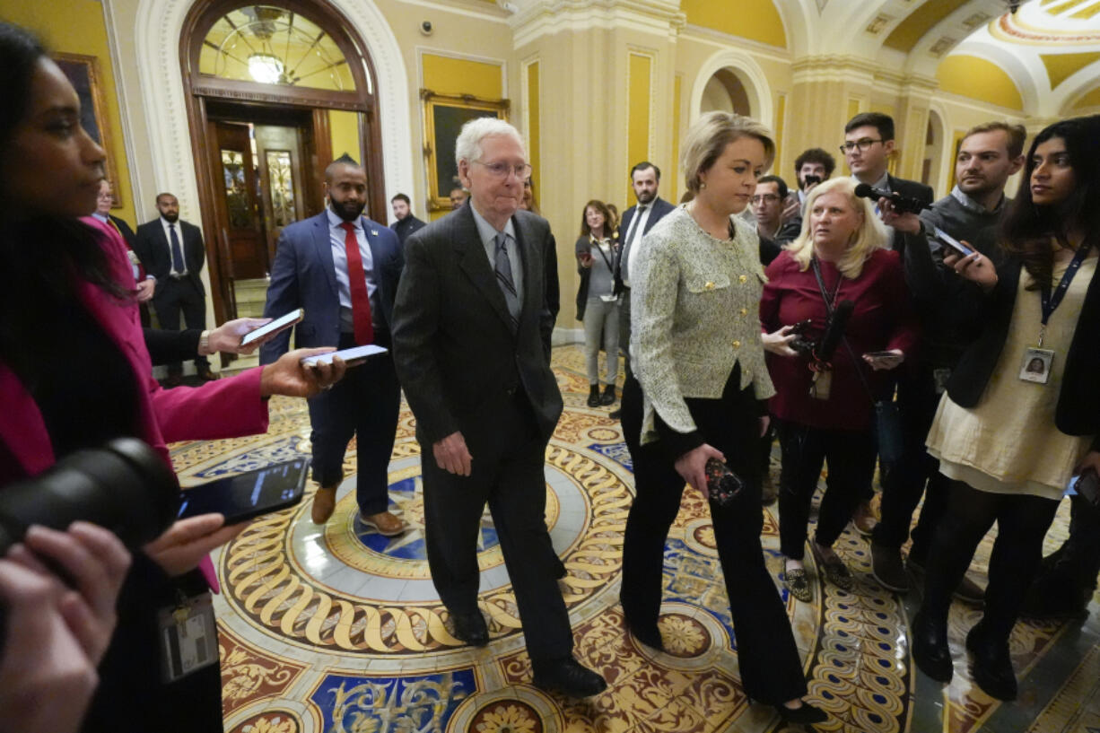 Senate Minority Leader Mitch McConnell of Ky., walks past members of the media after delivering remarks on the Senate floor, Wednesday, Feb. 28, 2024 on Capitol Hill in Washington. McConnell says he&rsquo;ll step down as Senate Republican leader in November. The 82-year-old Kentucky lawmaker is the longest-serving Senate leader in history.