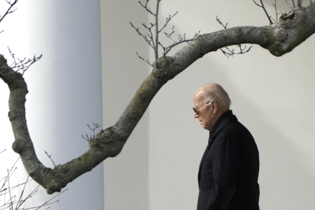 FILE - President Joe Biden walks out of the White House to board Marine One on the South Lawn in Washington, Jan. 12, 2024. Biden is convening top congressional leaders at the White House to press for his $110 billion national security package at a pivotal time. Wednesday afternoon&rsquo;s meeting comes as senators narrow on a landmark immigration deal that could unlock the stalled aid to Ukraine, Israel and other U.S. allies.