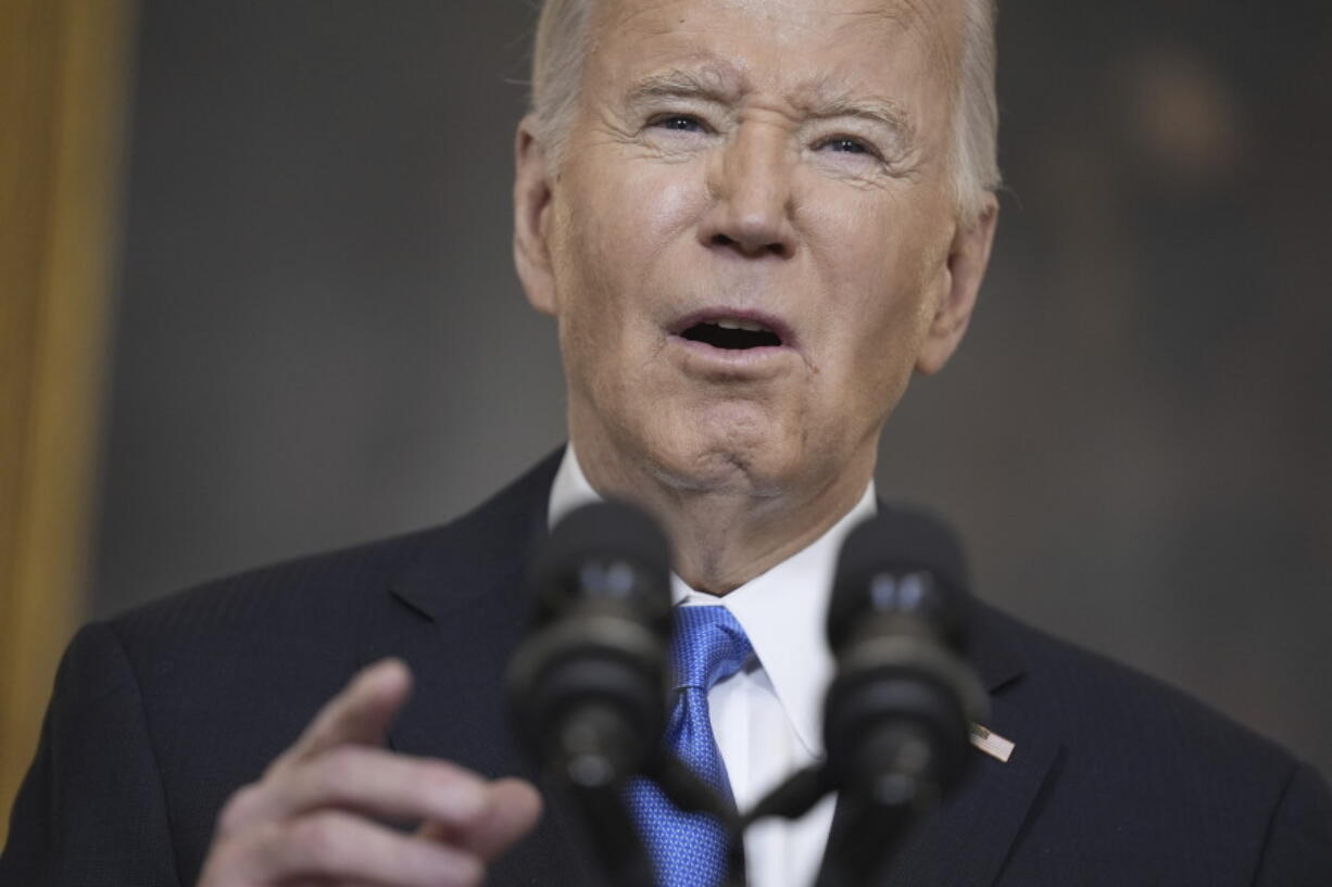 President Joe Biden delivers remarks on a $95 billion Ukraine Israel aid package being debated in Congress, in the State Dining Room of the White House, Tuesday, Feb. 13, 2024, in Washington.