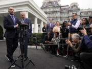 House Minority Leader Hakeem Jeffries, D-N.Y., speaks as Senate Majority Leader Chuck Schumer of N.Y., listens as they talk with reporters outside the West Wing after meeting with President Joe Biden at the White House in Washington, Tuesday, Feb. 27, 2024.