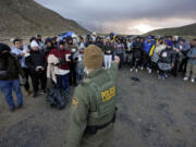 Gregory Bull/Associated Press, Border Patrol agents ask asylum-seeking migrants to line up in a makeshift, mountainous campsite after the group crossed the border with Mexico Feb. 2 near Jacumba Hot Springs, Calif. Immigration policies have become a big issue in 3rd Congressional District race., Gregory Bull/Associated Press, Asylum-seeking migrants wait to be processed in a makeshift, mountainous campsite after crossing the border with Mexico Feb. 2 near Jacumba Hot Springs, Calif. Immigration policies have become a big issue in 3rd Congressional District race., Leslie Lewallen of Camas, Republican candidate, is seeking election to represent the 3rd Congressional District., Contributed photo, U.S. Rep. Marie Gluesenkamp Perez, D-Skamania, Joe Kent of Yacolt, Republican candidate, is seeking election to represent the 3rd Congressional District., Associated Press files, gregory bull/Associated Press, A Border Patrol agent asks asylum-seeking migrants to line up in a makeshift, mountainous campsite after the group crossed the border from Mexico on Feb. 2 near Jacumba Hot Springs, Calif., eric gay/Associated Press, Concertina wire is stretched through Shelby Park along the Rio Grande on  Feb.