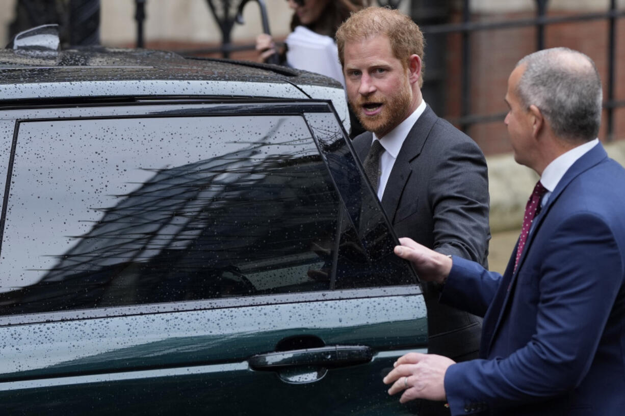 FILE - Britain&rsquo;s Prince Harry leaves the Royal Courts Of Justice in London, Tuesday, March 28, 2023. Prince Harry was not improperly stripped of his publicly funded security detail during visits to Britain after he gave up his status as a working member of the royal family and moved to the U.S., a London judge ruled Wednesday Feb. 28, 2024.