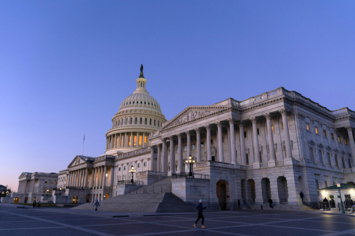 The U.S. Capitol is seen at sunrise, Wednesday, Feb. 7, 2024, in Washington. A Senate deal on border enforcement measures and Ukraine aid has suffered swift and total collapse. Republicans withdrew support despite President Joe Biden urging Congress to &ldquo;show some spine&rdquo; and stand up to Donald Trump. But Senate Republican Leader Mitch McConnell says that a deal to pair border policy changes with $60 billion in wartime aid for Ukraine is dead.