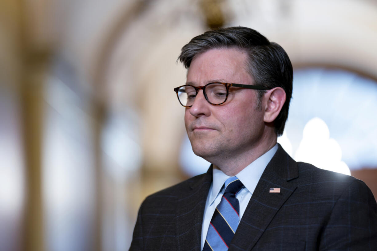 House Speaker Mike Johnson, R-La., stands outside his office during a meeting with the Speaker of the Israeli Knesset, Amir Ohana, at the Capitol in Washington, Tuesday, Feb. 6, 2024. (AP Photo/J.