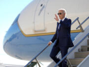 President Joe Biden arrives at John F. Kennedy International Airport in New York, Wednesday, Feb. 7, 2024, to travel to Manhattan to attend fundraisers.