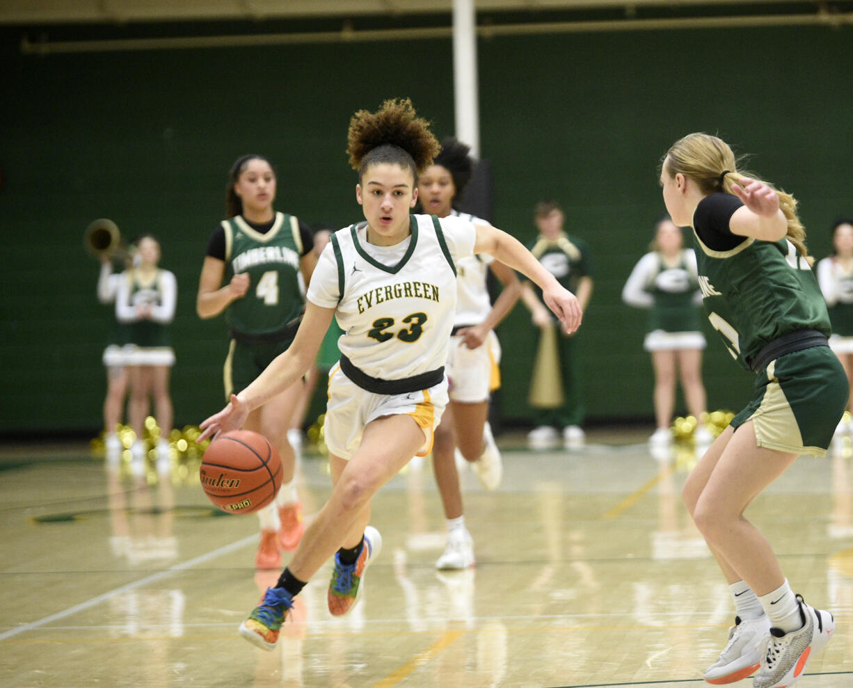 Adrian Wright (23) of Evergreen works against Hannah Jackson of Timberline in a 3A bi-district girls basketball playoff game at Evergreen High School on Friday, Feb. 9, 2024.