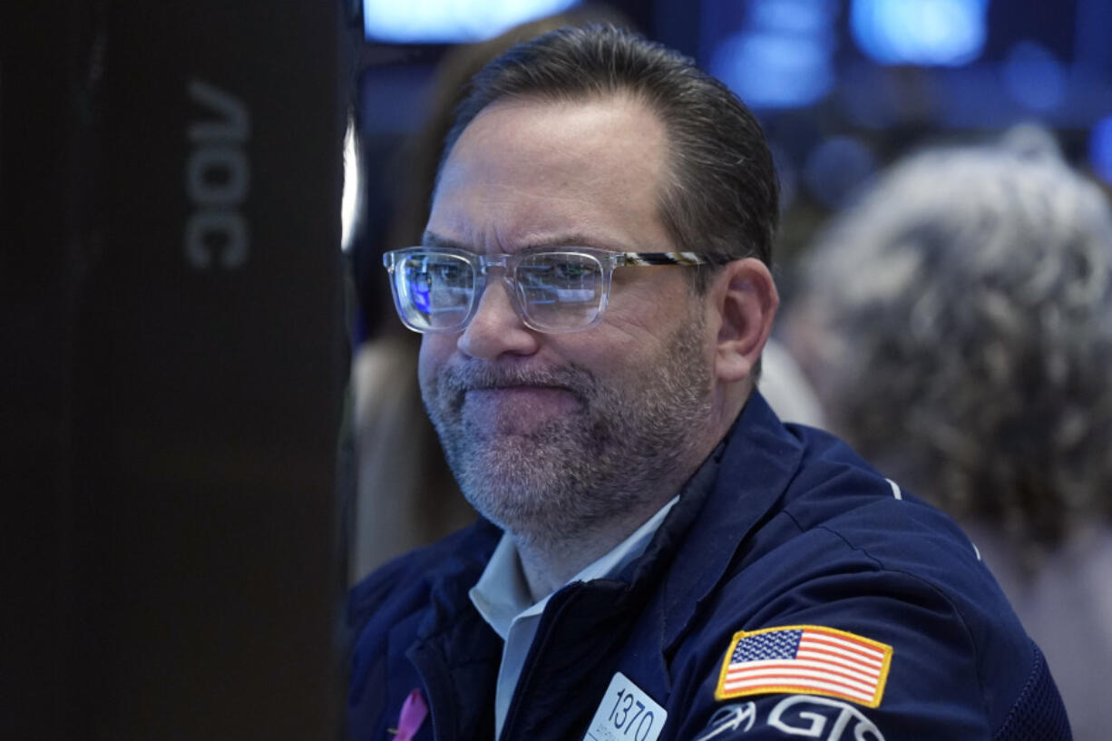 Specialist Anthony Matesic works at his post on the floor of the New York Stock Exchange, Wednesday, Jan. 31, 2024.