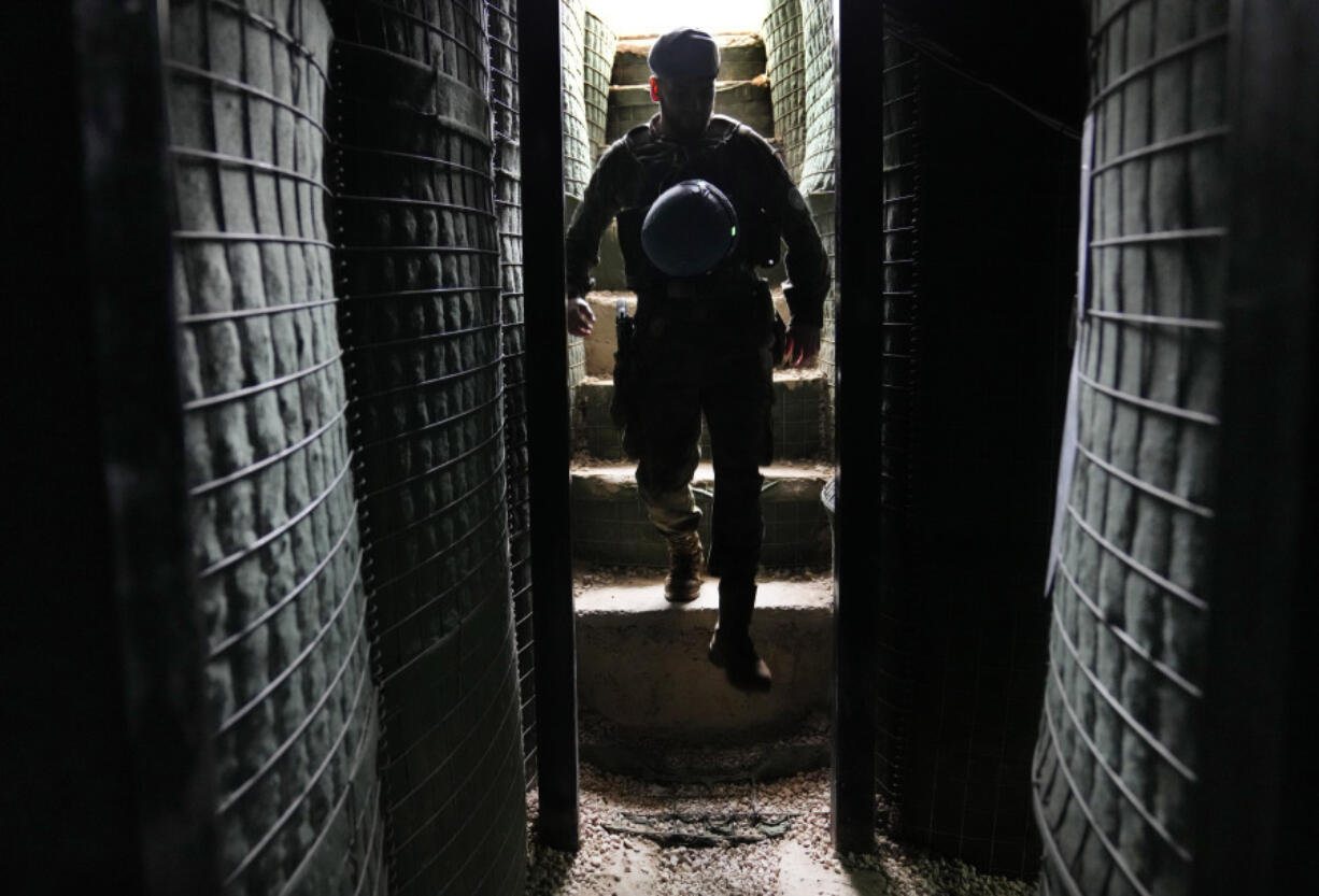 A Spanish U.N. peacekeeper enters a shelter at a base in Abbassiyeh, a Lebanese border village with Israel, on Wednesday, Jan. 10, 2024. The prospect of a full-scale war between Israel and Lebanon&rsquo;s Hezbollah militia terrifies people on both sides of the border, but some see it as an inevitable fallout from Israel&rsquo;s ongoing war against Hamas in Gaza.