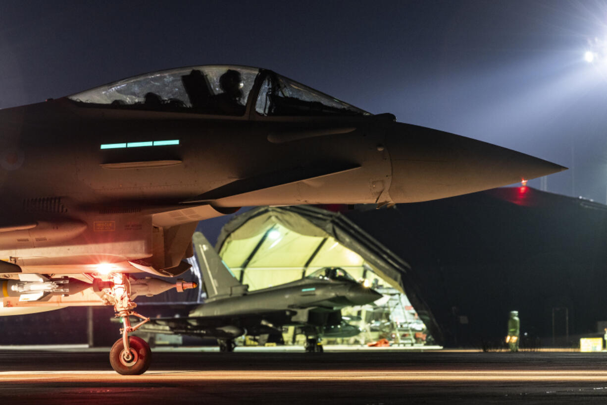 In this photo provided by Britain&rsquo;s Ministry of Defense, a Royal Air Force Typhoon aircraft prepares to take off, along with others, to conduct further strikes against Houthi targets in Yemen, Saturday, Feb. 24, 2024. The strikes answer a recent surge in attacks by the Iran-backed militia group on ships in the Red Sea and Gulf of Aden. (Cpl.