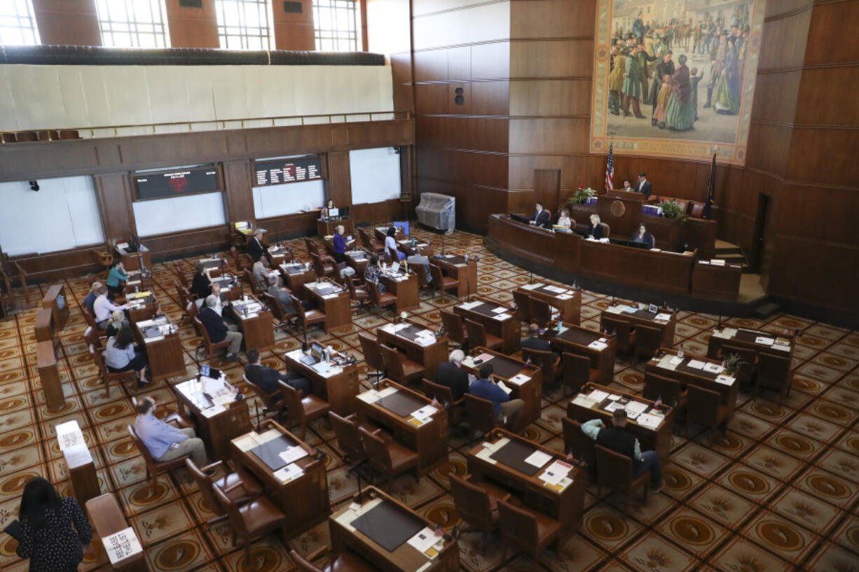 FILE - The state senate convenes at the Oregon State Capitol in Salem, Ore., Thursday, May 11, 2023. The Oregon Supreme Court said Thursday, Feb. 1, 2024, that 10 Republican state senators who staged a record-long walkout last year to stall bills on abortion, transgender health care and gun rights cannot run for reelection.