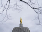 Clouds hover over the Oregon State Capitol on Wednesday, Jan. 31, 2024, in Salem, Ore.