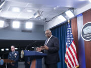 Defense Secretary Lloyd Austin speaks at a Pentagon press briefing at the Pentagon on Thursday, Feb. 1, 2024 in Washington.