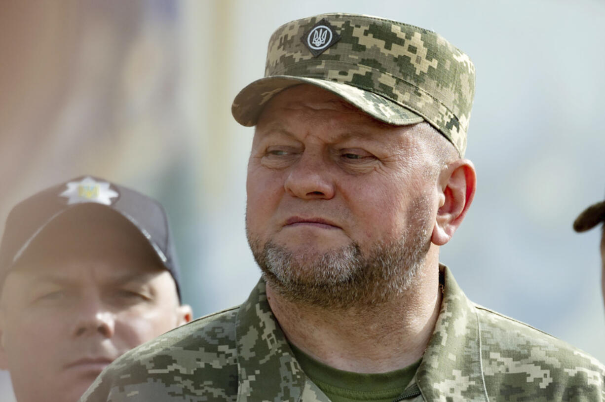 In this photo provided by the Ukrainian Presidential Press Office, Commander-in-Chief of Ukraine's Armed Forces Valerii Zaluzhnyi, front, attends an event for marking Statehood Day in Mykhailivska Square in Kyiv, July 28, 2023. Ukrainian President Volodymyr Zelenskyy said Feb. 8 he met with Zaluzhnyi and told him it's time for someone new to lead the army.